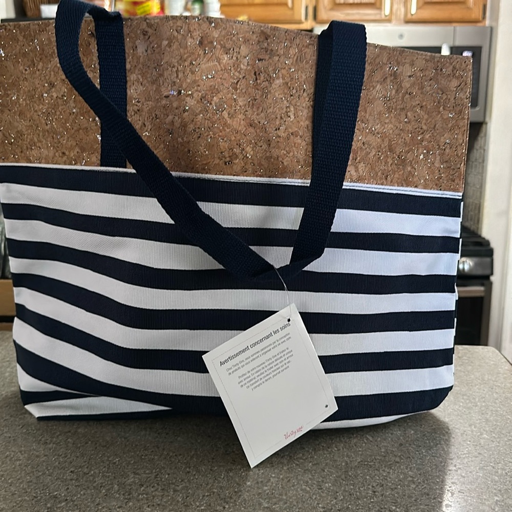 NWT- thirty one getaway tote in cabana stripe.